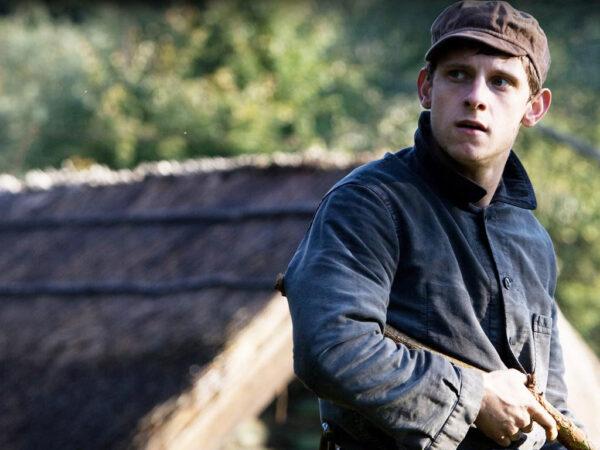 Fiery Asael (Jamie Bell) escapes from the Nazis with his brothers. (MovieStillsDB)