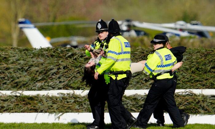 More Than 100 Arrested as Activists Delay Grand National
