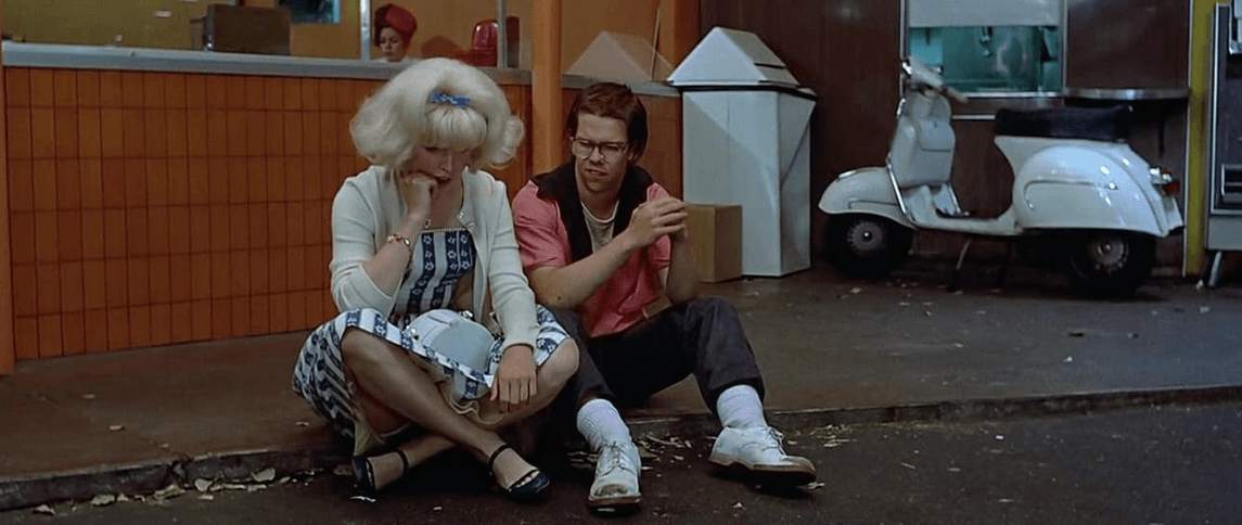 Debbie (Candy Clark) and Toad (Charles Martin Smith) recounting their night's worth of cheap thrill adventures, in “American Graffiti.” (Lucasfilm Ltd./The Coppola Company/Universal Pictures)