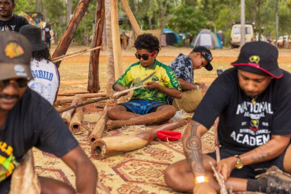 Indigenous men make spears during Garma Festival 2022 at Gulkula in East Arnhem, Australia, on July 30, 2022. (Tamati Smith/Getty Images)