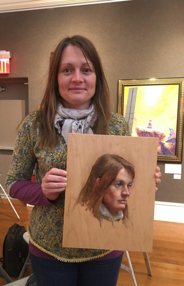 British artist Paula Wilson with her portrait sketch by New York-based artist Ken Goshen. (Courtesy of Paula Wilson)