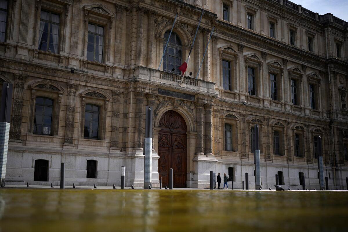 The government building after a mound of gas meters was dumped outside in Marseille, southern France, on April 17, 2023. (Daniel Cole/AP Photo)