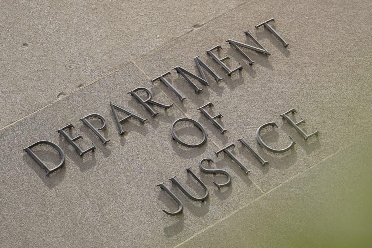 The U.S. Department of Justice building in Washington on March 28, 2023. (Madalina Vasiliu/The Epoch Times)