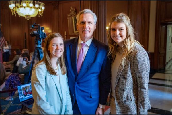 Female athletes Chloe Satterfield (L) and Macy Petty (R) meet with House Speaker Kevin McCarthy (R-Calif.) in Washington on Feb. 1, 2023. (Courtesy of Concerned Women of America)