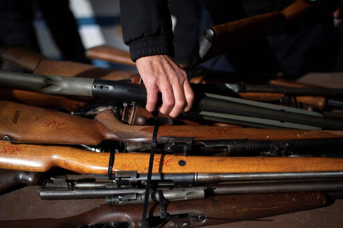 Firearms are displayed in Houston on February 18, 2023. (Mark Felix/AFP via Getty Images)