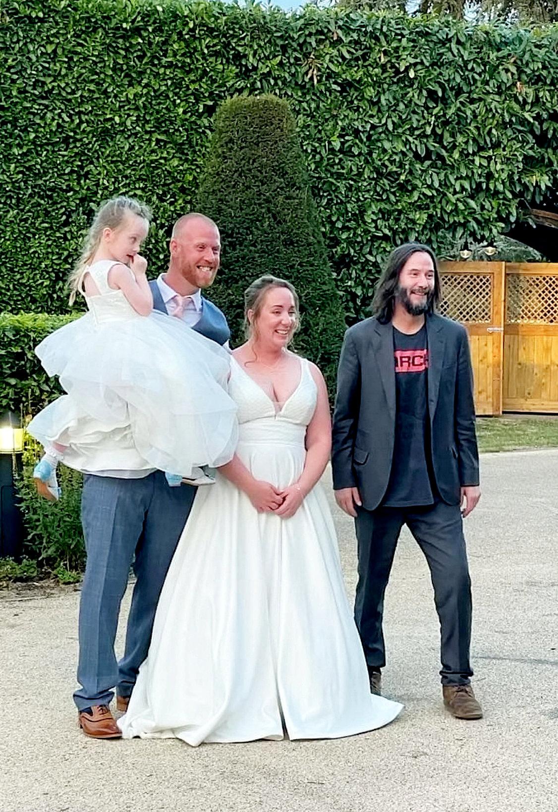 Keanu Reeves "gate-crashed" a couple's wedding in Daventry, Northamptonshire, UK. (SWNS)