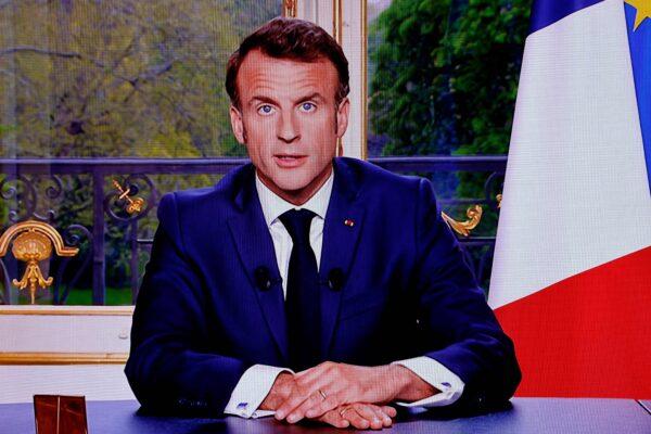 A photo of a television screen shows French President Emmanuel Macron during a televised address to the nation, made from the Elysee Palace in Paris on April 17, 2023. (Ludovic Marin/AFP via Getty Images)