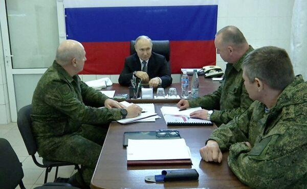 Russian President Vladimir Putin visits the headquarters of the "Dnieper" army group in the Kherson region of Russian-controlled Ukraine, in this still image from a handout video released on April 18, 2023. (Kremlin.ru/Handout via Reuters)