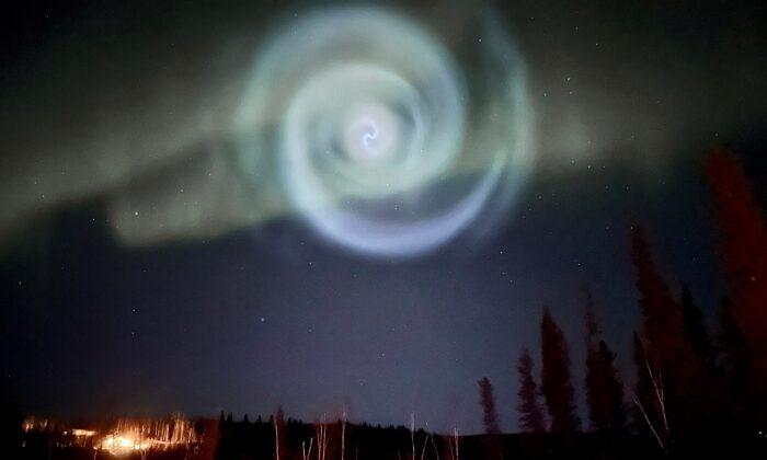 Odd Spiral Appears Amid Northern Lights in Alaska Night Sky