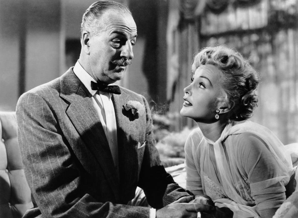 A publicity still for "We're Not Married" in 1952 with Louis Calhern (L) and Zsa Zsa Gabor. (MovieStillsDB)
