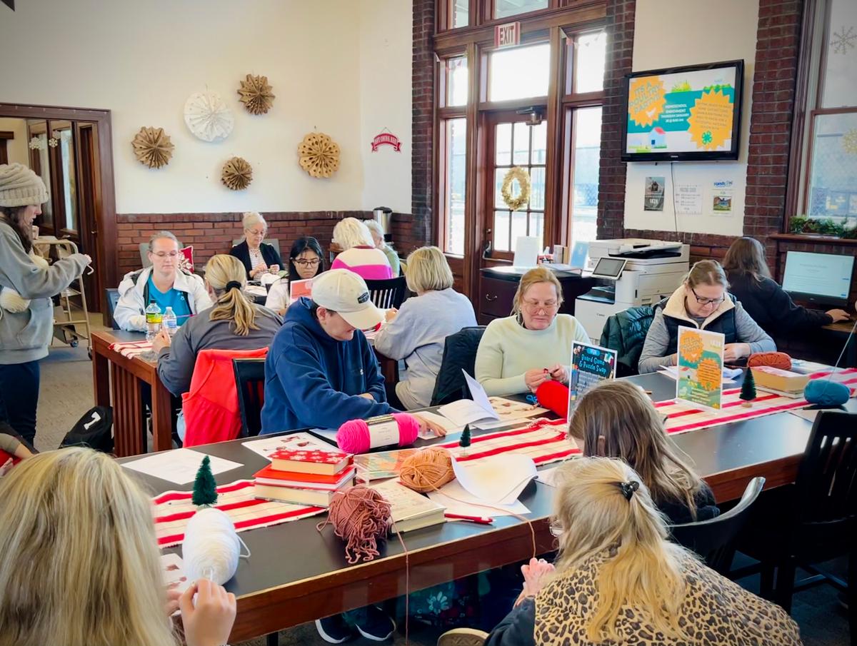 A crochet class brings together members of the community at Unicoi County Public Library in Erwin, Tenn. (Courtesy of Suzy Bomgardner)