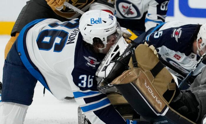 Winnipeg Jets Forward Barron Receives 75-plus Stitches After Skate to Face