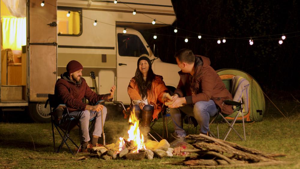 Campfires are the best place for making new lifelong friends, as you share stories and bond. (DC Studio/Shutterstock)