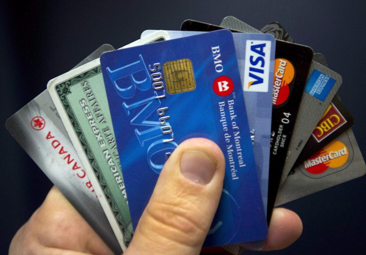 A file photo of debit and credit cards displayed in Montreal, Canada. (Ryan Remiorz/The Canadian Press)