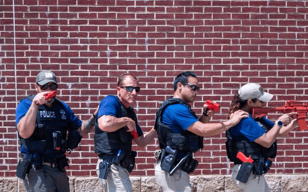 Enforcement and Removal Operations (ERO) deportation officers move in a stack prior to entering a building during training at the Federal Law Enforcement Training Center (FLETC), in Glynco, Georgia, on April 13, 2022. (DoD photo by Erica Knight)