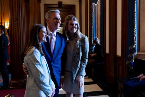 House Speaker Kevin McCarthy (R-Calif.) (C) takes a picture with former tennis player Chloe Satterfield (L) and Macy Petty, an NCAA volleyball player during a girls' and women's sports panel at the U.S. Capitol Building in Washington, on Feb. 1, 2023. (Anna Moneymaker/Getty Images)