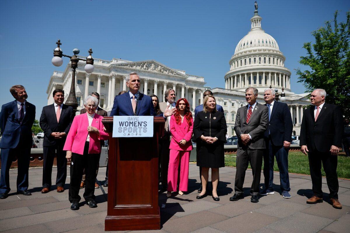 Speaker of the House Kevin McCarthy (R-Calif.) joins Rep. Virginia Foxx (R-Va.), track and field athlete Selina Soule (in pink suit), and other Republicans for an event to celebrate the House's passing of the Protection of Women and Girls in Sports Act outside the U.S. Capitol in Washington on April 20, 2023. (Somodevilla/Getty Images)