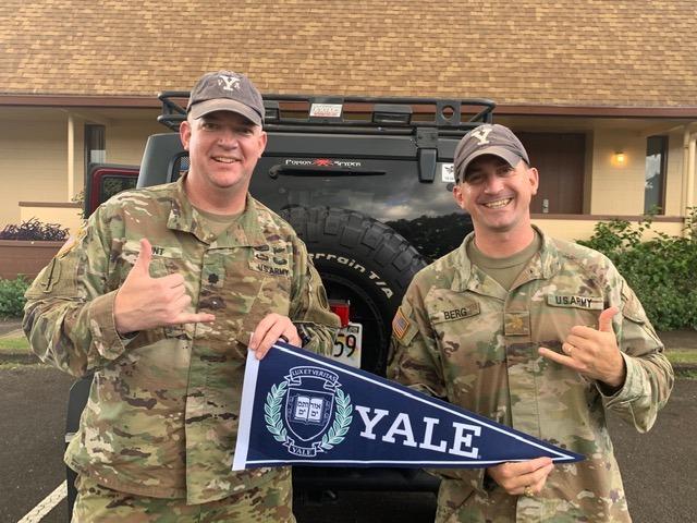 Author (left) and then-Major Lukas Berg, Yale graduates, YVA members, and Army veterans. (Courtesy of Charles Faint)