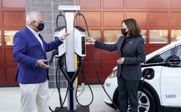 Vice President Kamala Harris (R) speaks with SemaConnect CEO Mahi Reddy at the Prince George's County Brandywine Maintenance Facility during a visit to announce the Biden-Harris Administration’s Electric Vehicle Charging Action Plan, in Brandywine, Md., on Dec. 13, 2021. (Kevin Lamarque/Reuters)