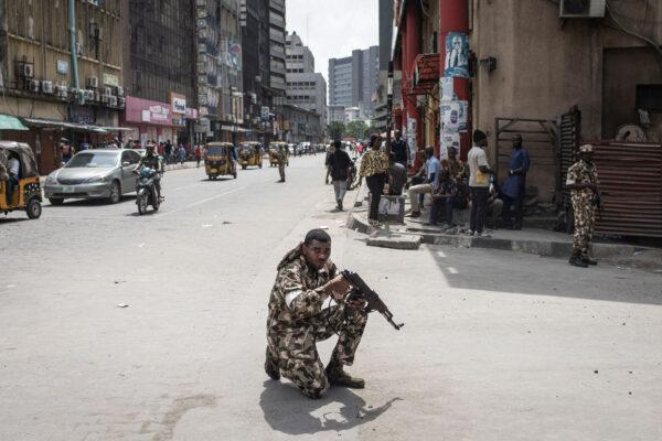 A soldier from the Nigerian Armed Forces takes position and secures the streets in Lagos Island, Lagos, Nigeria, on Feb. 27, 2023. (John Wessels/AFP via Getty Images)