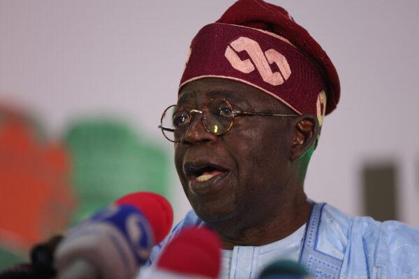 Ruling party candidate Bola Tinubu addresses supporters in Abuja, Nigeria, on March 1, 2023, during celebrations at his campaign headquarters. (Kola Sulaiman/AFP via Getty Images)
