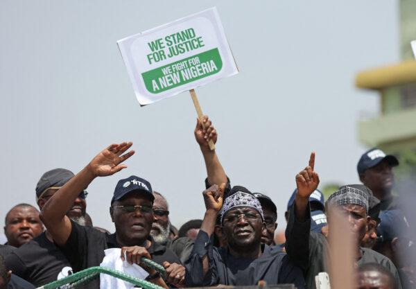 Candidate of Nigeria's Peoples Democratic Party, Atiku Abubakar (second from L), leads supporters to protest at Independent National Electoral Commission (INEC) headquarters, over the results of Nigeria's 2023 presidential and general election in Abuja, Nigeria, on March 6, 2023. (Kola Sulaiman/AFP via Getty Images)