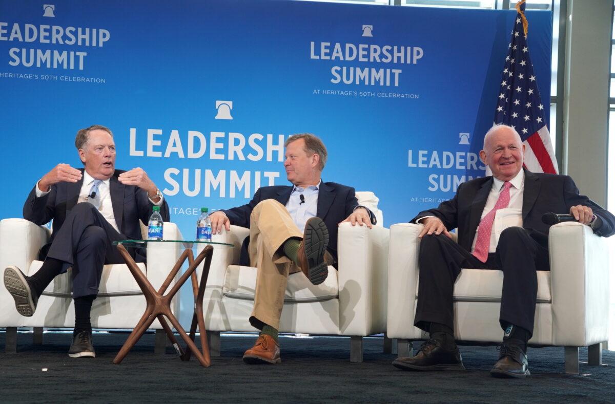 Amb. Robert Lighthizer (C), Peter Schweizer, president of Government Accountability Institute, and Michael Pillsbury, senior fellow at the Heritage Foundation (R) at the Heritage Foundation's Leadership Summit in National Harbor, Md., on Apr. 20, 2023. (Terri Wu/The Epoch Times)