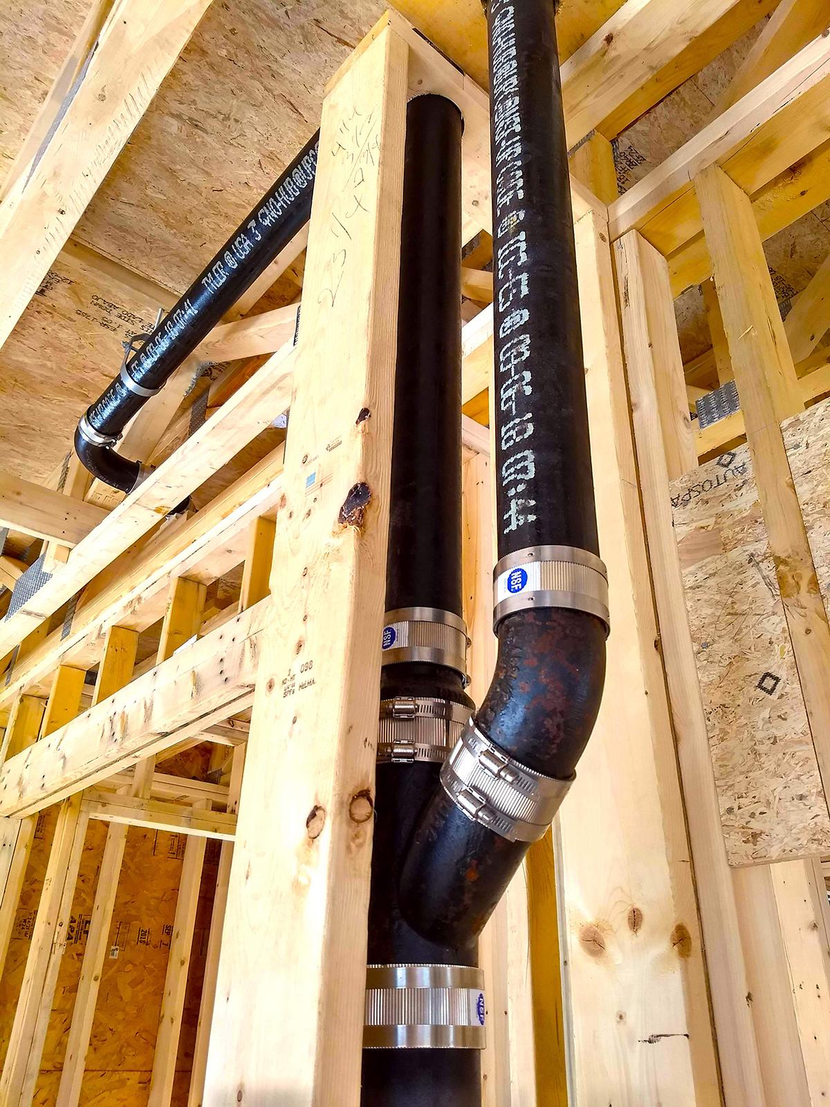 This cast iron stack connects to standard PVC or ABS plastic pipe with ease. At the very least, use it for the vertical stacks behind the walls in finished living spaces. (Tim Carter/Tribune Content Agency/TNS)