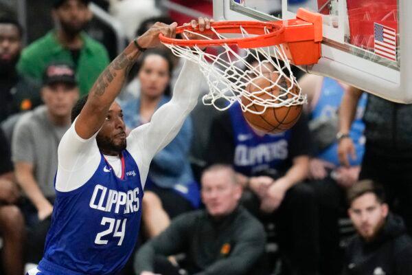 Los Angeles Clippers guard Norman Powell (24) dunks during the first half of Game 3 of a first-round NBA basketball playoff series against the Phoenix Suns in Los Angeles on April 20, 2023. (Ashley Landis/AP Photo)