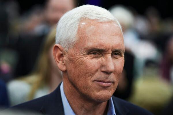 Former Vice President Mike Pence meets with guests at the Iowa Faith & Freedom Coalition in Clive, Iowa, on April 22, 2023. (Madalina Vasiliu/The Epoch Times)