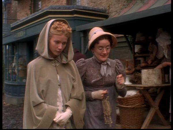 At one point in the novel, Emma makes fun of Miss Bates, who's of a lower social class, and comes to realize her mistake. Emma (Gwyneth Paltrow) walks with Miss Bates (Sophie Thompson) in the 1995 film production of "Emma." (Miramax Films)