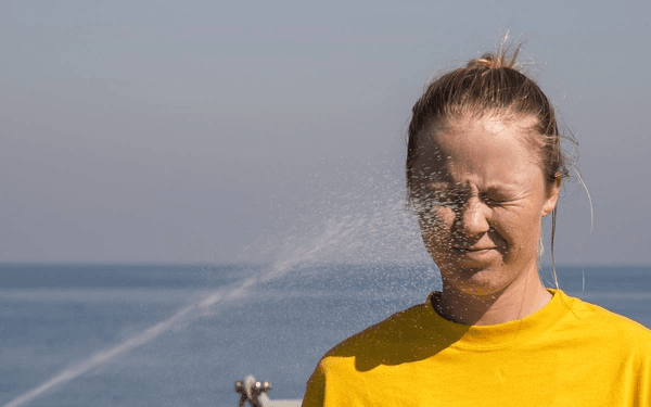 Seaman Amanda Morris, assigned to the guided-missile destroyer USS Hopper (DDG 70) is sprayed with oleoresin capsicum spray during Armed Sentry and Security Reaction Force basic qualifications. (U.S. Navy photo by Mass Communication Specialist 1st Class Martin Cuaron/Released)