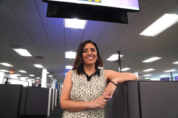Cassie Villegas, senior director of contact center operations and clinical services at Solari Crisis and Human Services in Tempe, Ariz., leads a team of crisis call takers on April 13, 2023. (Allan Stein/The Epoch Times)
