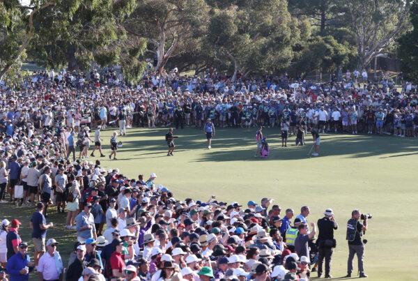 Talor Gooch on the 18th with the surging crowd during day three of LIV Golf Adelaide at The Grange Golf Course in Adelaide, Australia, on April 23, 2023. (Sarah Reed/Getty Images)