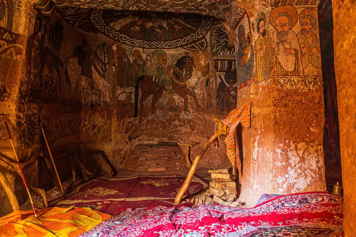 Paintings adorn the interior of Abuna Yemata Guh, located in the Tigray region of Ethiopia. (Framalicious/Shutterstock)