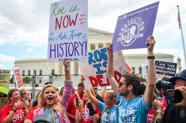 Pro-life supporters celebrate outside the Supreme Court in Washington after the overturning of Roe v. Wade on June 24, 2022. (Olivier Douliery/AFP via Getty Images)