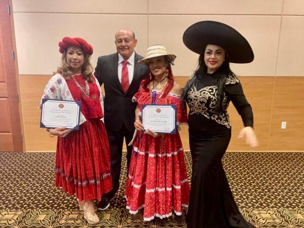 Rep. Lou Correa poses for a photo with honorees at the sixth annual “Women of the Year” awards ceremony at Chapman University in Orange, Calif., on April 22, 2023. (Carol Cassis/The Epoch Times)