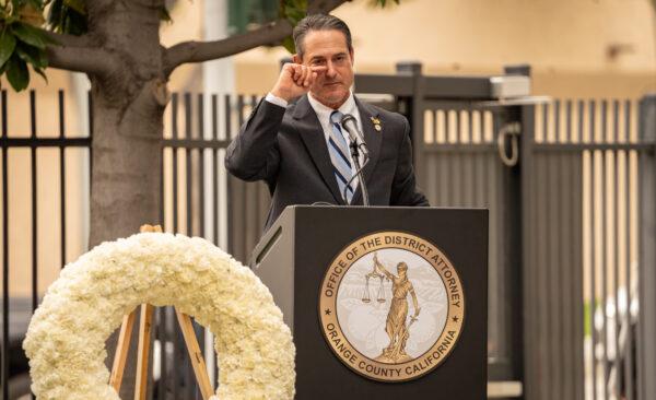 Orange County District Attorney Todd Spitzer clears his eyes of tears in Santa Ana, Calif., on April 24, 2023. (John Fredricks/The Epoch Times)