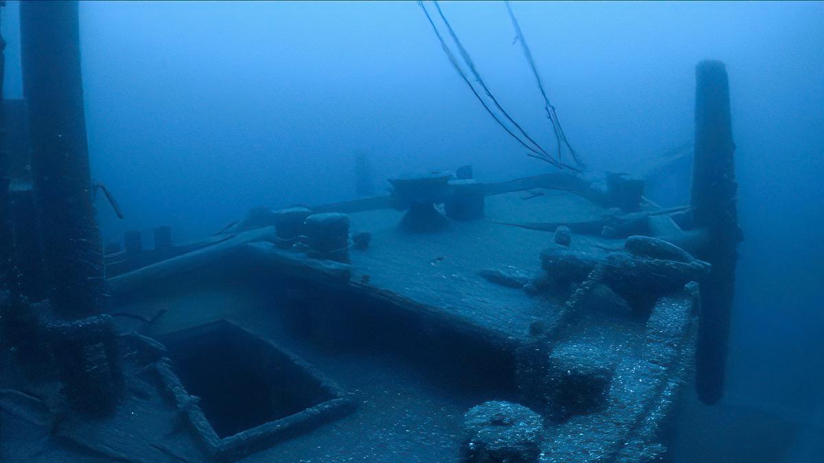 An anchor rests on the bow of sunken schooner barge Ironton, lost in a collision in 1894. Today the vessel sits upright and remains intact with all three masts still standing. (Courtesy of NOAA Thunder Bay National Marine Sanctuary, Undersea Vehicles Program UNCW, Ocean Exploration Trust)
