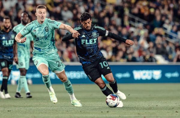 Los Angeles FC forward Carlos Vela (10) dribbles the ball against Nashville SC defender during the second half at Geodis Park in Nashville on Apr 22, 2023. (Courtesy of LAFC)