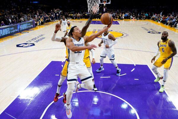 Memphis Grizzlies' Desmond Bane, center, shoots against the Los Angeles Lakers during the first half in Game 4 of a first-round NBA basketball playoff series on April 24, 2023, in Los Angeles. (Jae C. Hong/AP Photo)