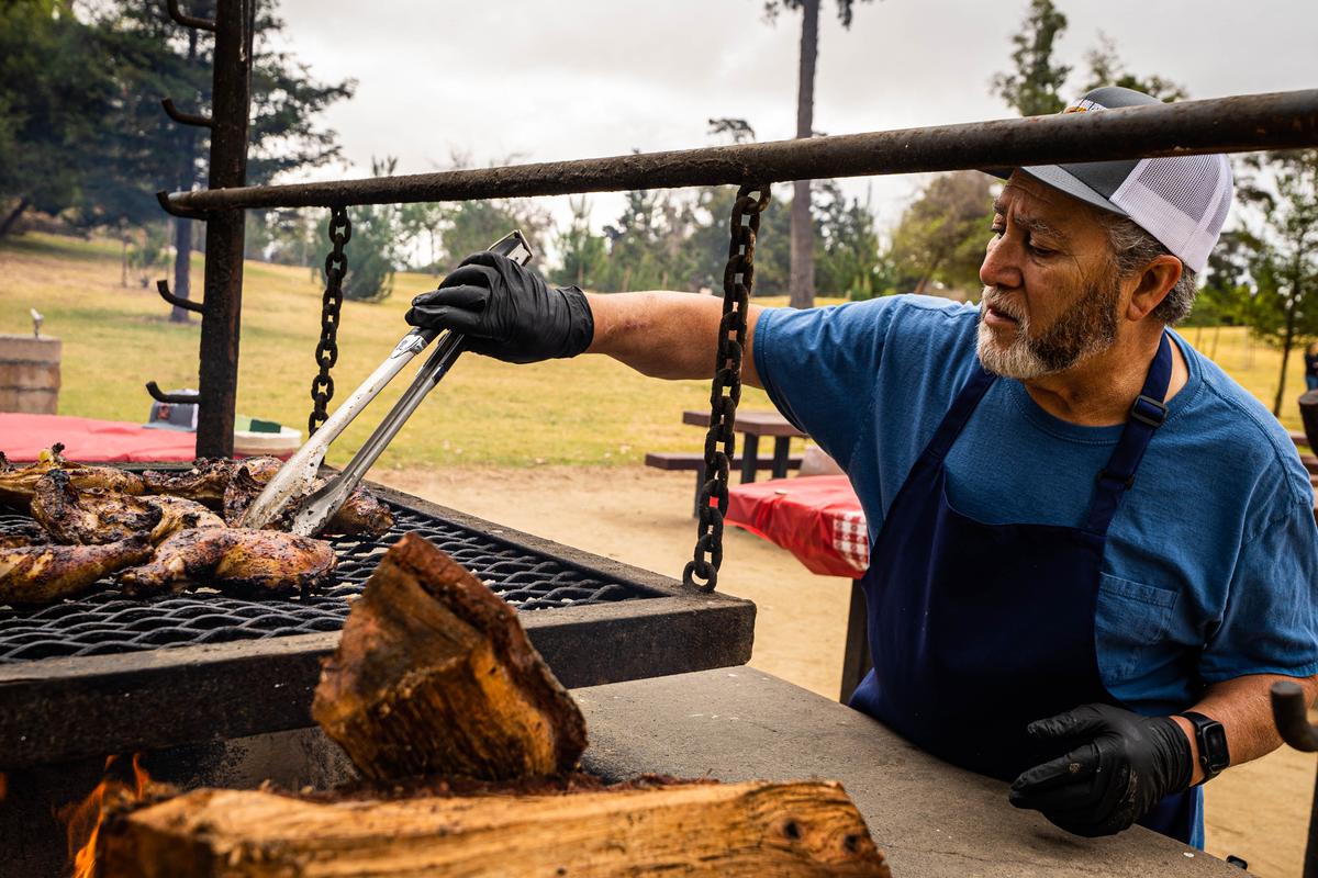 Cooking over an open pit at Waller Park in Santa Maria, Calif. (Courtesy of Santa Maria Valley)