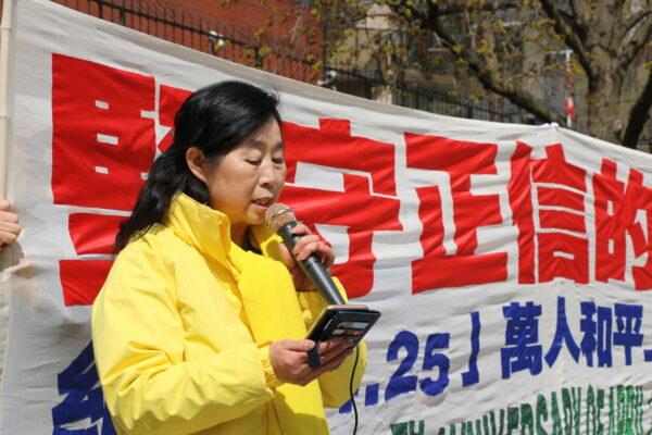 Falun Gong practitioner Pan Xuefeng speaks at a rally outside the Chinese Consulate in Toronto on April 25, 2023, in commemoration of the peaceful appeal in Beijing 24 years ago. (Andrew Chen/The Epoch Times)