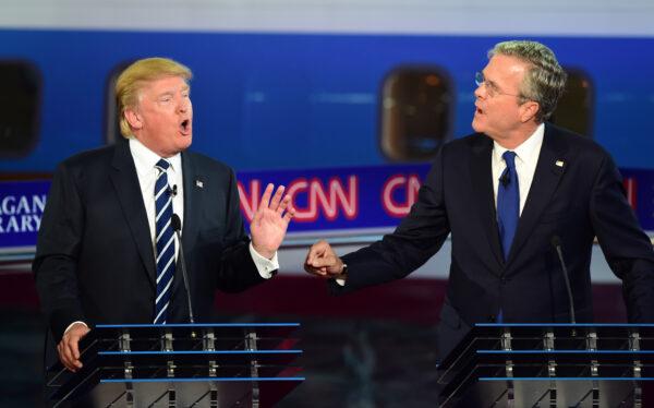 Then-Republican presidential hopefuls Donald Trump and Jeb Bush speak during the Presidential debate at the Ronald Reagan Presidential Library in Simi Valley, California on Sept. 16, 2015. (FREDERIC J. BROWN/AFP via Getty Images)