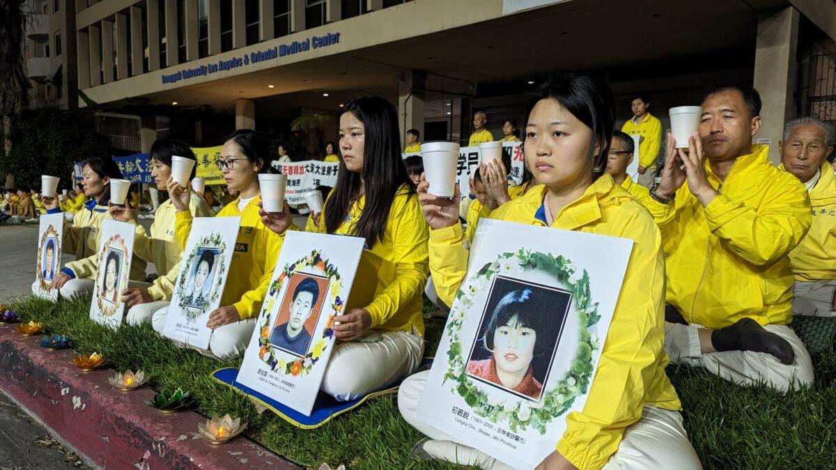 Falun Gong adherents hold a candlelight vigil in front of the Chinese Consulate to mark 24 years of persecution by the Chinese Communist Party in Los Angeles on April 23, 2023. (Emma Hsu/The Epoch Times)