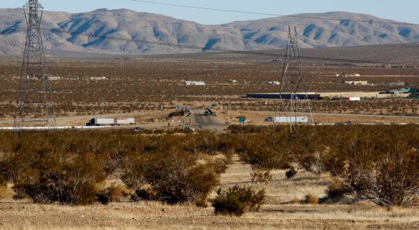 The site, foreground of a proposed station for a high-speed rail line to Las Vegas, is seen with Interstate 15 on the outskirts of Victorville, Calif., on Jan. 25, 2012. (Reed Saxon/AP Photo)