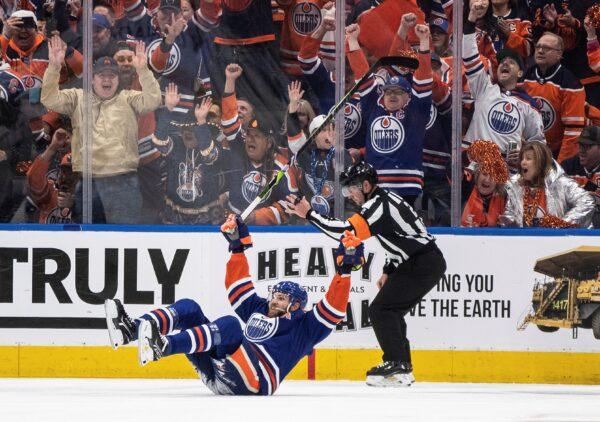 Edmonton Oilers' Leon Draisaitl celebrates a goal against the Los Angeles Kings during the first period of an NHL Stanley Cup first round playoff hockey game in Edmonton, Alberta, on April 25, 2023. (Jason Franson/The Canadian Press via AP)