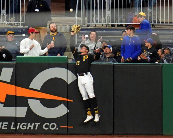 <br/>Pittsburgh Pirates left fielder Jack Suwinski (65) leaps to make the catch on a fly ball hit by Los Angeles Dodgers' Mookie Betts during the sixth inning of a baseball game in Pittsburgh on April 25, 2023. (Gene J. Puskar/AP Photo)