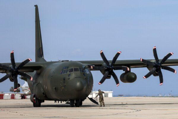 A British Royal Air Force C-130 Hercules military transport that was carrying evacuees from Sudan is pictured on the tarmac at Larnaca International Airport, in Cyprus, on April 26, 2023. (Christina Assi/AFP via Getty Images)