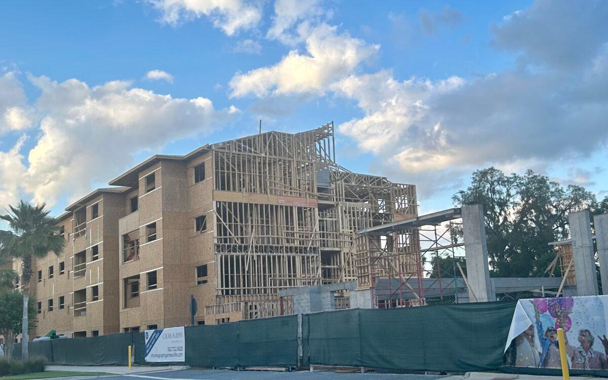 Florida's rapid growth is among the factors making ambitious federal power plant regulations unfeasible, the state Department of Environmental Protection says. Here a Gainesville apartment complex nears completion on April 23, 2023. (Nanette Holt/The Epoch Times)